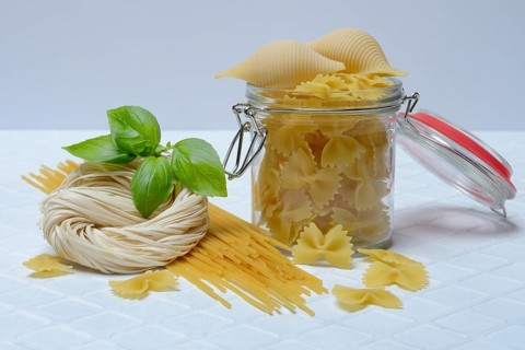 Various types of pasta with glass container, pasta varieties