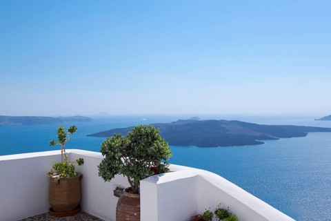Terrace on the crater rim, in the background volcanic island Nea Kameni, Firà, Thira, Santorini,