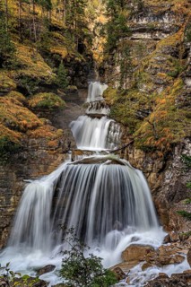 Waterfall in a gorge, cascades, autumn, Kuhflucht waterfall, near Oberau, Alpine foothills,