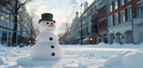 Snowman in an idylic winter urban scenery, snow-covered streets and buildings in background,