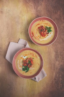 Pumpkin cream soup with shrimp, herbs and spices, homemade, no people