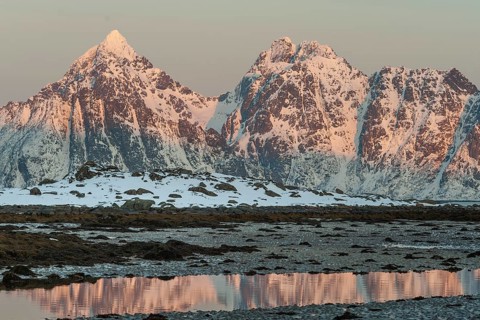 Rugged mountains, Lofoten island Vestvågøya at the fjord Gimsøystraumen, Lofoten, Northern Norway,