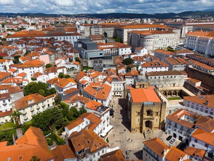 Central city view with old buildings and a striking historic church in the centre, aerial view,