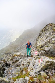 Hiker in the fog, Alpine dangers, Carnic Main Ridge, Carnic High Trail, Carnic Alps, Carinthia,