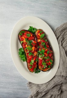 Traditional Turkish dish, Imam Bayildi, stuffed eggplant, with tomatoes and herbs, baked, no