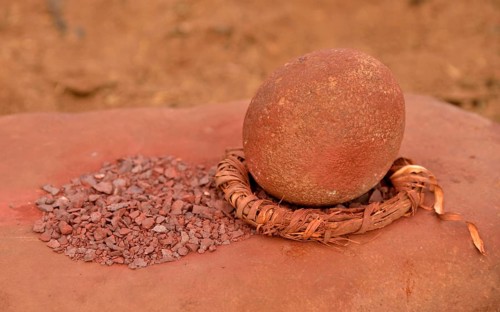 Grinding tool and red iron rocks ??used for the traditional skin cream of the Himba, Omuramba,