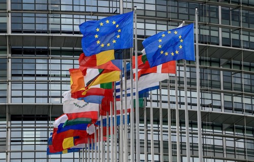 European flags in the wind in front of the European Parliament, Louise Weiss Building, Strasbourg,