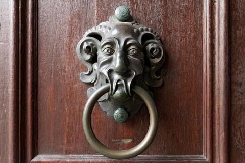 Old door knocker with face of a mythical creature, New Residence, Bamberg, Upper Franconia,