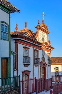 Baroque church facade and colonial houses in the city of Diamantina in Minas Gerais, Brasil