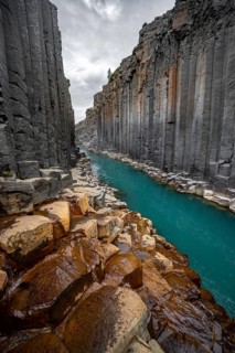 Stuðlagil Canyon, turquoise river between basalt columns, Egilsstadir, Iceland, Europe