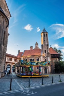 Children's carousel in front of Dankwarderode Castle, Brunswick, Lower Saxony, Germany, Europe