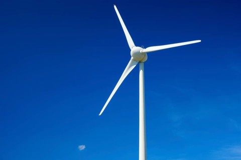 Green renewable alternative energy concept, wind generator turbines generating electricity in blue