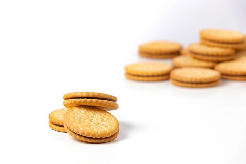 Double biscuits, white background, copy space