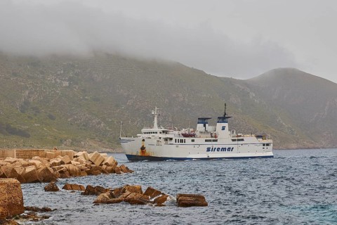 Fog, bad weather, Siremar car ferry, concrete breakwater, Favignana town, main town, Favignana,