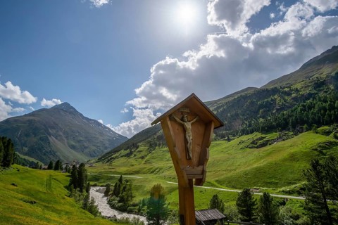 Jesus on the cross against the backdrop of the Alps, Vent, Ötztal, Tyrol, Austria, Europe