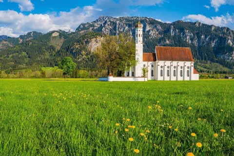 Baroque church of St. Coloman, behind it the Tegelberg mountain range, 1881m, Schwangau, Ostallgäu,
