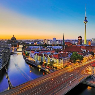City panorama with Spree, Cathedral, Nikolai Quarter, Red City Hall and TV Tower in the evening,