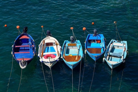 Fishing boats in the harbour of Riomaggiore, Cinque Terre, province of La Spezia, Liguria, Italy,