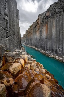Stuðlagil Canyon, turquoise river between basalt columns, Egilsstadir, Iceland, Europe