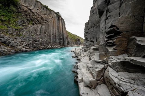 Stuðlagil Canyon, turquoise river between basalt columns, Egilsstadir, Iceland, Europe
