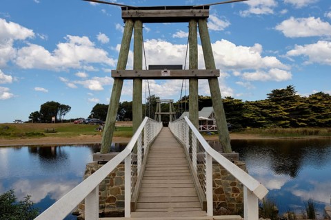 Spanning across the Erskine River, the Swing Bridge grants pedestrian access to the beach, Lorne,