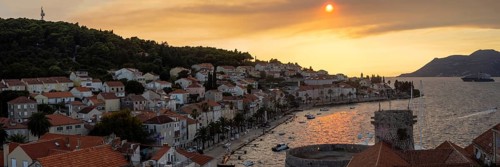 Cloudy mood at sunset by the sea, harbour of Korcula, panoramic shot, island of Korcula, Dalmatia,