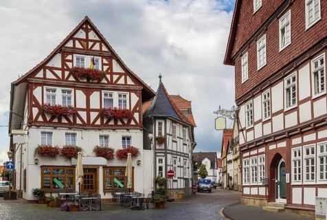 The street with picturesque ancient half-timbered houses in the Fritzlar city, Germany, Europe