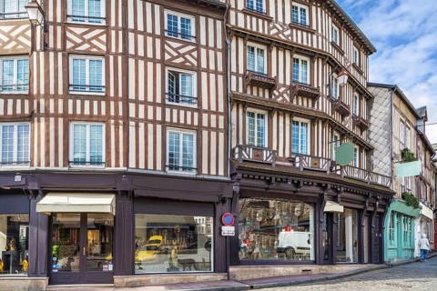Street with historical half-timbered houses in Honfleur, France, Europe