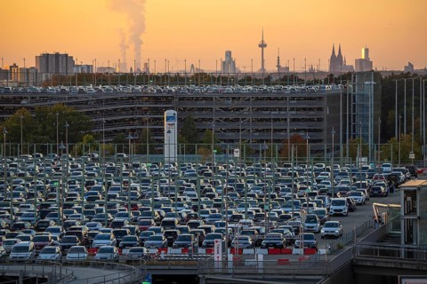 Full car park P2, at Cologne-Bonn Airport, behind car park P3 and the Cologne skyline, North