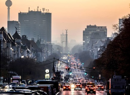 Berlin's landmarks on the busy Kaiserdamm and Bismarckstraße are shrouded in fog during the morning
