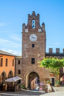 The clock tower in the medieval Gradara Castle, Marche, Italy, Europe