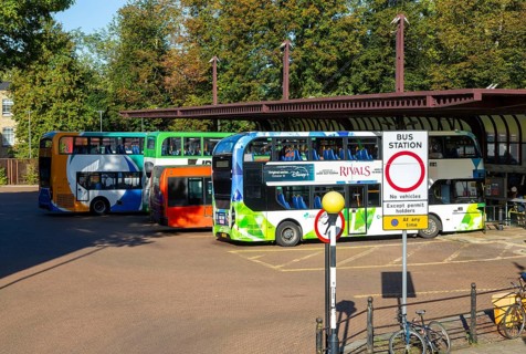 Double-decker busses in city centre bus station, Cambridge, Cambridgeshire, England, UK