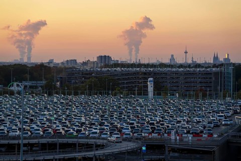Full car park P2, at Cologne-Bonn Airport, behind car park P3 and the Cologne skyline, North