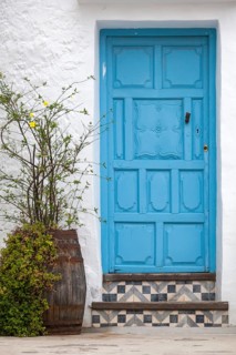 House facade with blue front door, Frigiliana, Costa del Sol, Andalusia, Spain, Europe