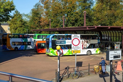 Double-decker busses in city centre bus station, Cambridge, Cambridgeshire, England, UK