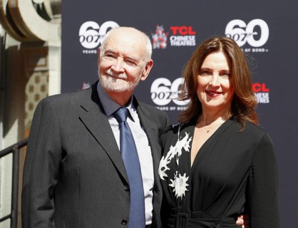 James Bond 60th anniversary celebration. Producers Michael G. Wilson and Barbara Broccoli place