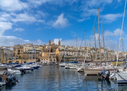 Valletta, Malta, 23 December, 2023: many boats in the Grand Harbor of Valletta with the city of