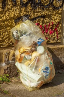 Yellow bag for plastic waste standing on the Bürgergsteig, waste separation, Germany, Europe