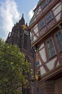 Corner detail of a colorful half timbered house, house to the Golden Libra, in the new historic old