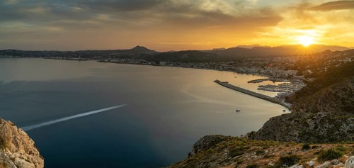 Panorama landscape view of Javea Bay and port in Alicante Province at sunset