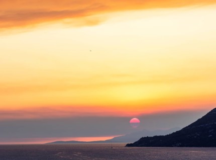 Cloudy mood at sunset by the sea, view from the bell tower, near Korcula, Korcula Island, Dalmatia,