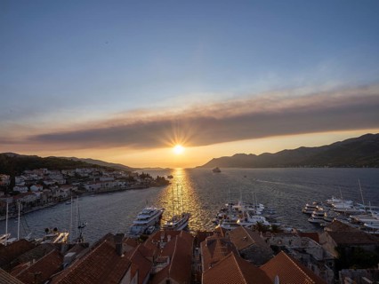 Evening atmosphere in front of sunset, view from the bell tower, Korcula harbour, Korcula island,
