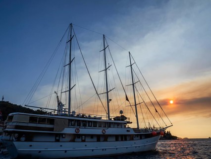 Evening atmosphere in front of sunset, sailing yacht, harbour of Korcula, island of Korcula,