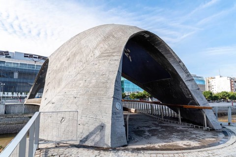 Madrid, Spain, December 9, 2019: Modern concrete bridge over Manzanares River in Madrid RIo area,