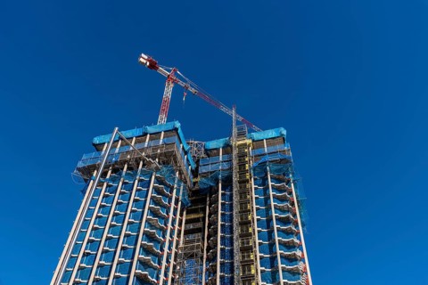 Madrid, Spain, February 14, 2021: Low angle view of Colon Towers under renovation. Nearly Zero