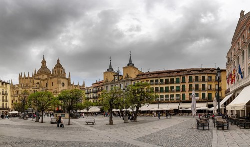 Segovia, Spain, 7 April, 2024: view of the Cathedral of Segovia and the Plaza Mayor square in the