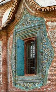 Tile platband at a window of the central apse of an altar of Church of Saint John Chrysostom in