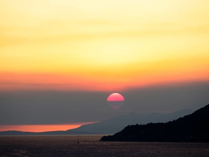 Cloudy mood at sunset by the sea, view from the bell tower, near Korcula, Korcula Island, Dalmatia,
