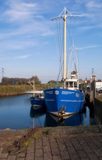 A fishing boat in the harbour of Nieuw-Beijerland on the river Spui in the Dutch region Hoeksche