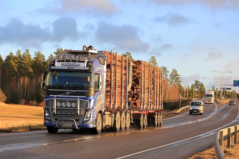 KAARINA, FINLAND, DECEMBER 5, 2016: Blue Volvo FH16 of Vuotila Oy for wood transport on the road